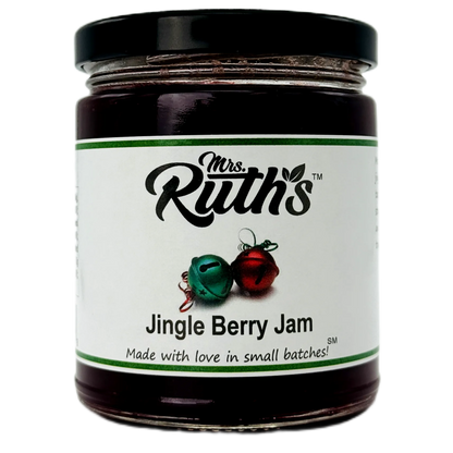 A glass jar of Mrs. Ruth's Jingle Berry Jam with a black lid and a white label featuring green and red accents, set against a plain white background.